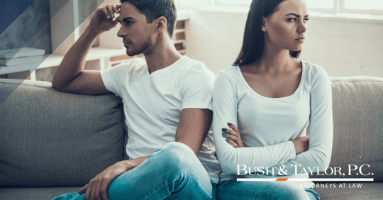 Couple sitting on the couch not speaking